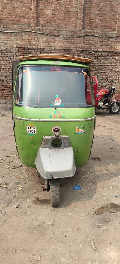 new Asia rickshaw head disc break hai all okay hai 14 model