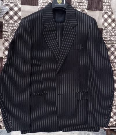 Black suit with white lining