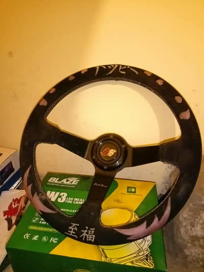 Selling NRG style sports racing steering wheel. Black 3-sp oke.