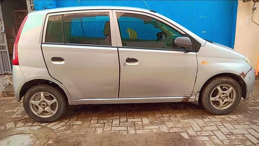 Daihatsu Mira 2003