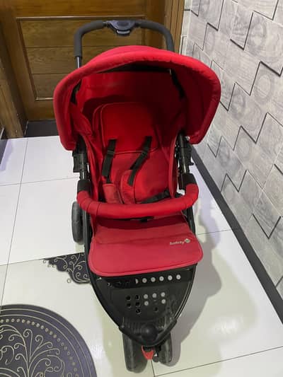 Baby Walker in excellent condition with plastic cover