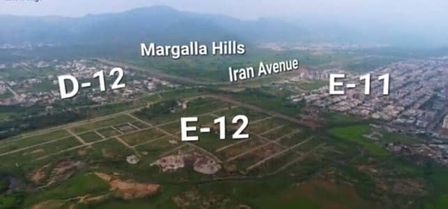 E-12/2 60x90 road back level plot reasonable price