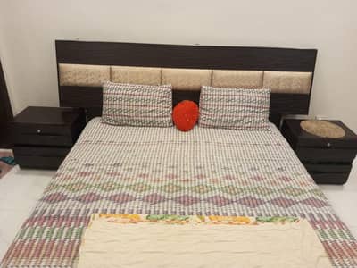 king size bed with side tables and dressing