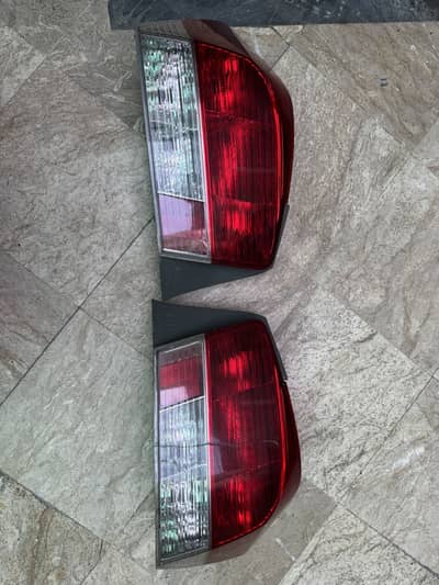 Back lights for honda city 2009 to 2013 model and three wheel covers