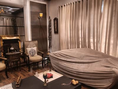 10 MARLA ELEGANT AND FULLY MAINTAINED OLD BUNGALOW WITH BASEMENT & SOLAR IS AVAILABLE IN THE BEST BLOCK OF DHA LAHORE.
