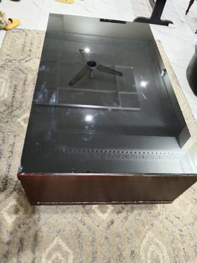 Center table with glass on top