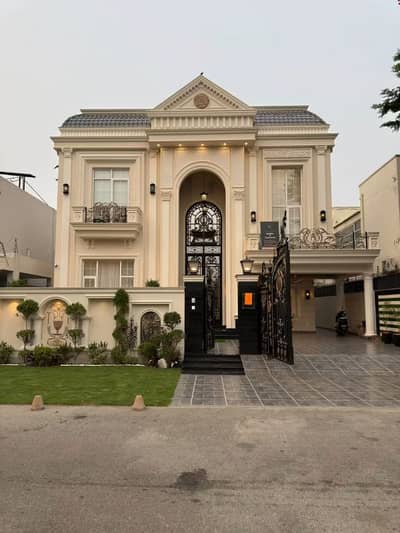 1 Kanal Spanish Design 5-Bedroom House For Sale in DHA Phase 6 Lahore 2 Servant Quarters in Basement, Prime Location Near Park, Mosque & Market