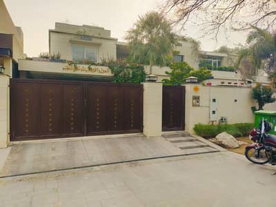 2 KANAL ELEGANT AND FULLY FURNISHED BUNGALOW NEAR GOLF & RAYA IS AVAILABLE IN THE BEST BLOCK OF DHA LAHORE