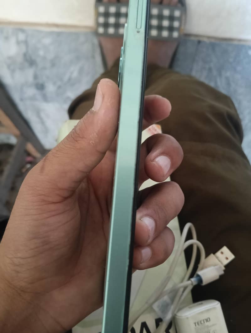 Tecno Spark Go1 6