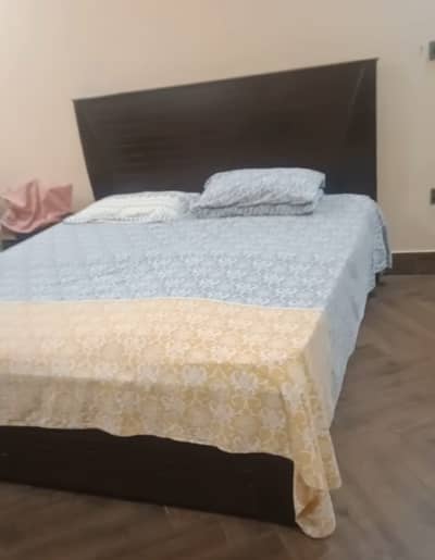 King size bed with 10 inches spring mattress.