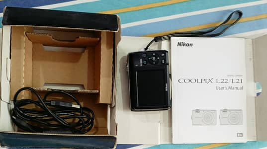 Digital camera along with box