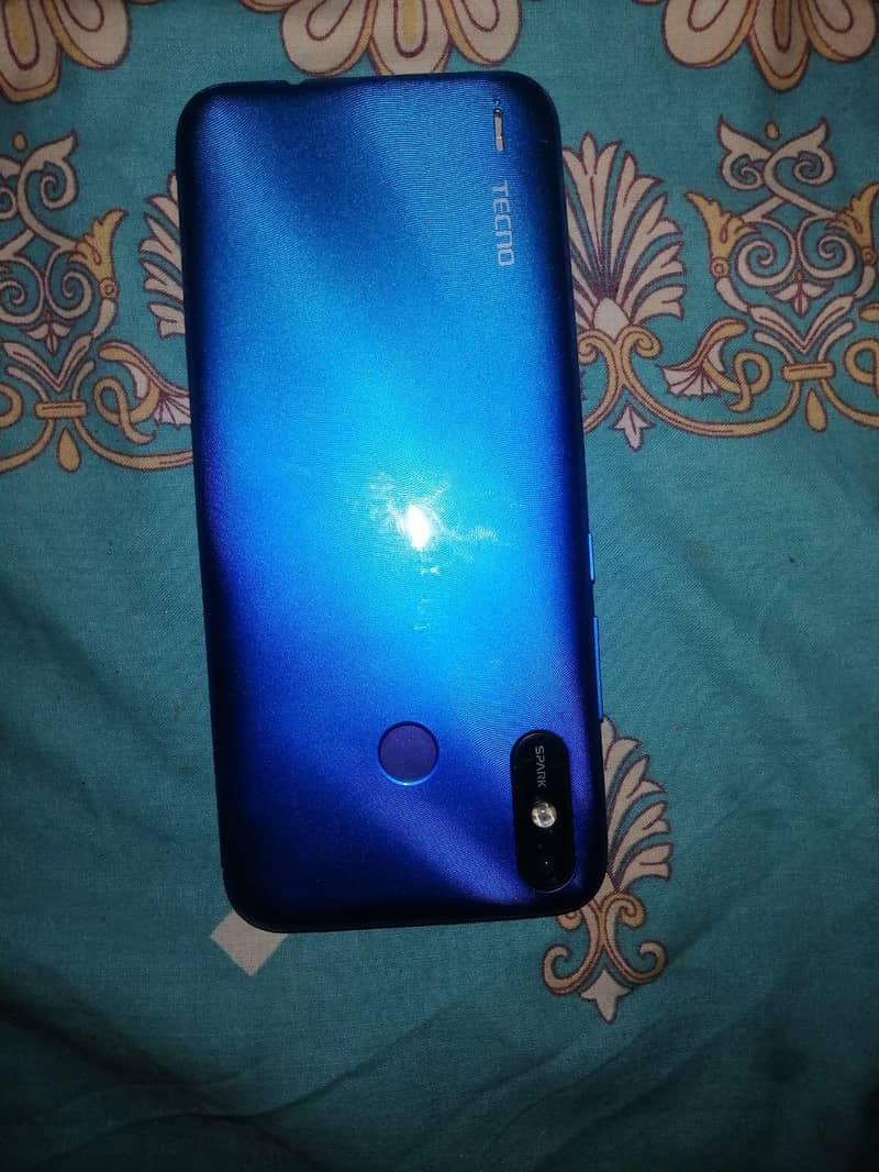 Tecno Spark 4 Lite 4
