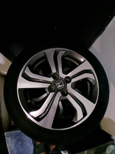 Japanese Alloy RIms and Bridgestone tyres