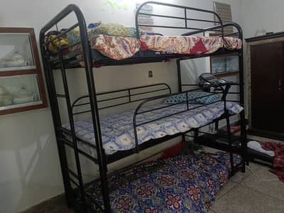 Iron bed for sale 3 matreses new condition.