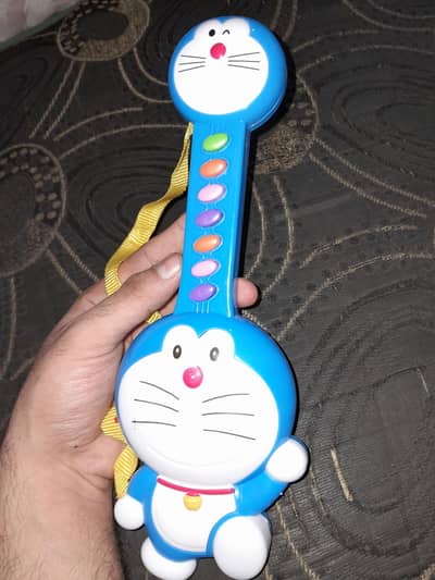 Doraemon Musical Toy Guitar for Kids – Colorful & Fun Play Guitar