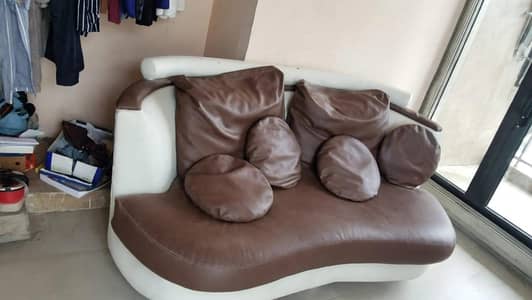 armless leather sofa