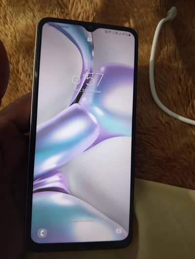 Samsung Mobile A12 4/64 all ok phone Hy daba Hy charger bhi Sath hai