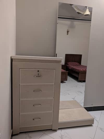 Dressing table with mirror and drawers