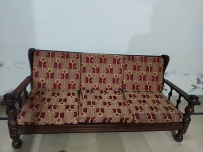 wooden sofa with cushions