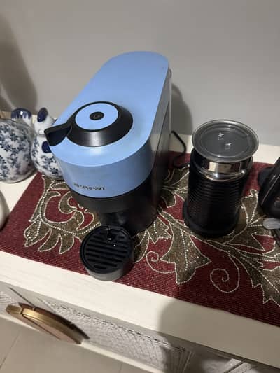 Almost new used only few days with milk frother bought from uk