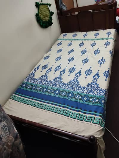 2 Single Wooden Bed for Sale 10000 each