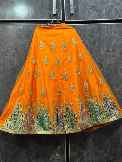 orange mehndi lehnga  medium  worn  once