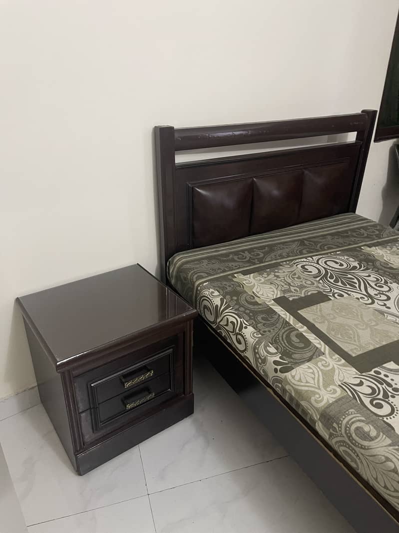 Single size brown bed 2