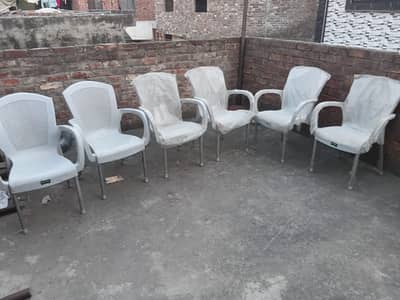 Plastic Chairs  6 and 1 Table for Sale