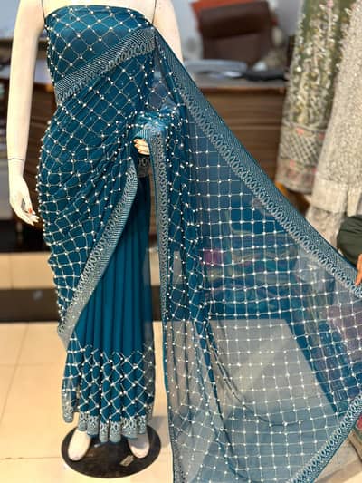 new designer indian saree by bridal boutique