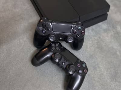 PS4 1tb with 2 controllers and games