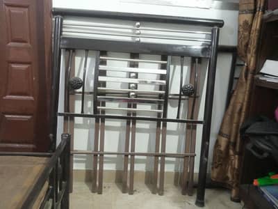 2 single iron beds with out mattress urgently sale
