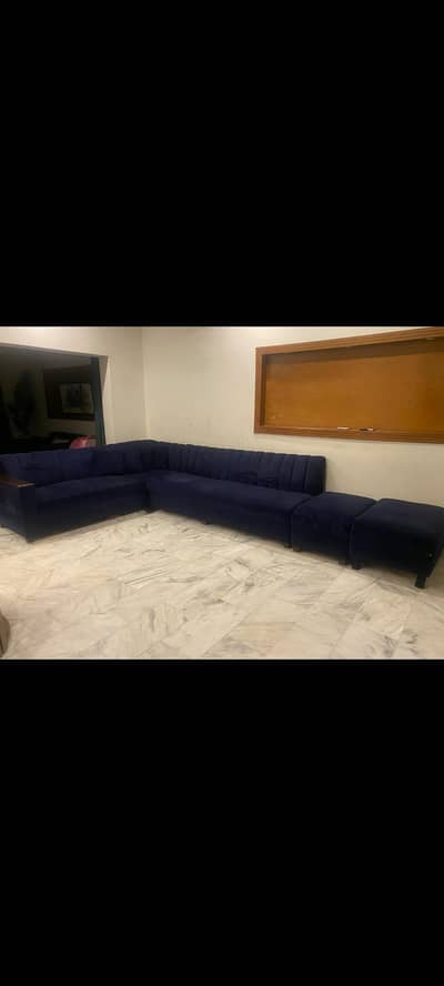 7 seater sofa and 2 puffies