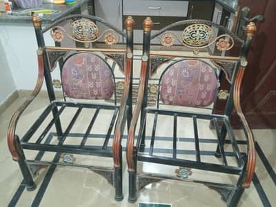 2 single seater iron sofa with cushions