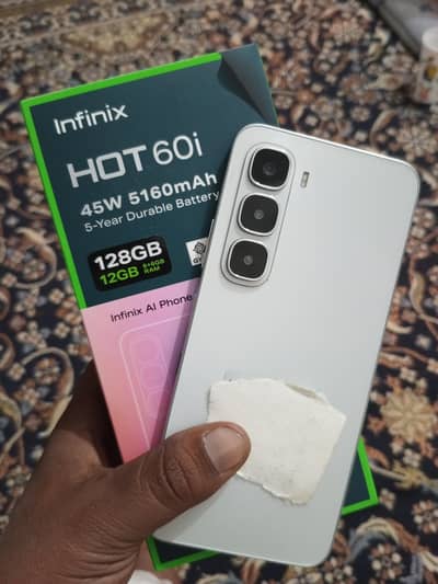 Infinix HOT 60i. . . FULL WARRANTY. . 6gb 128gb.
