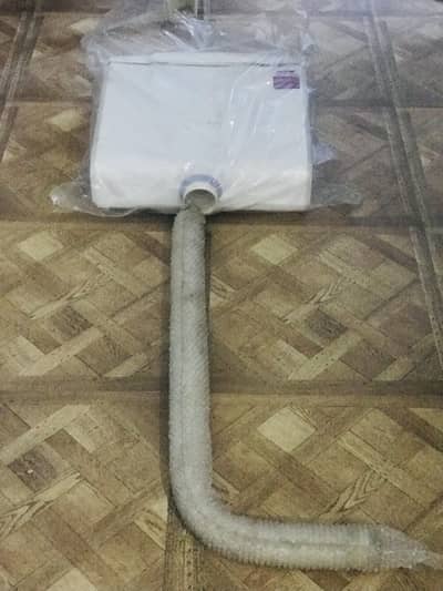 Master brand new flush tank, pipe and a P Trap