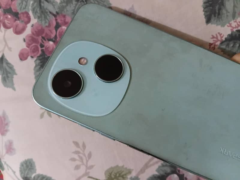 Tecno Spark Go 1 2