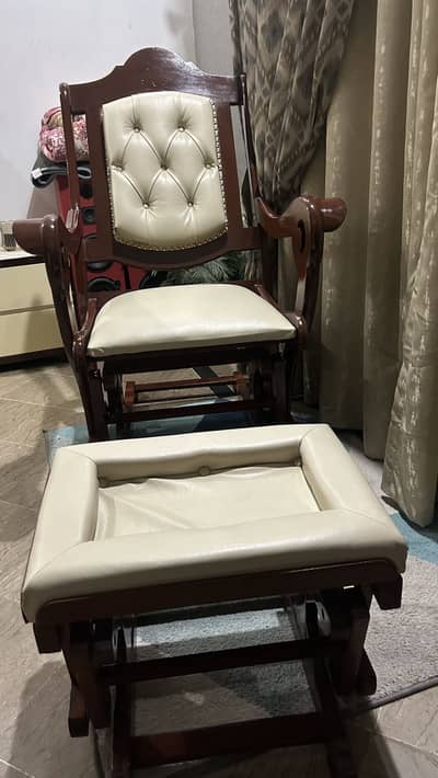 Elegent rocking chair with matching footstool