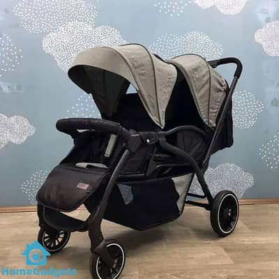 Double/twin Stroller by Kiddiko. Slightly used. with Box