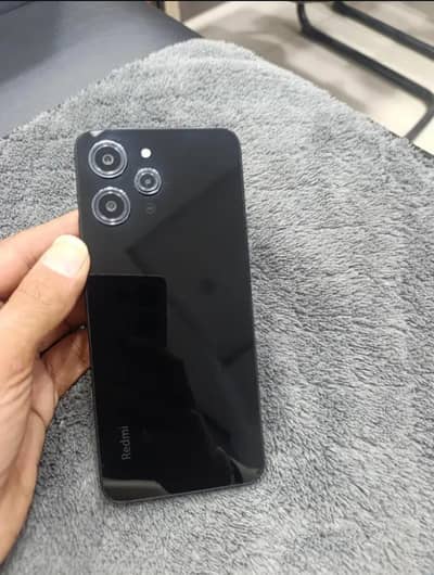 Redmi 12 8+256 sat cover hai