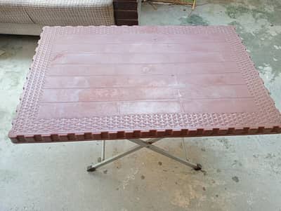 Plastic folding table