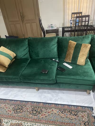 Used 6 seaters sofa in green color