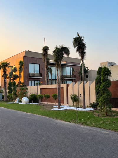 2 Kanal Lash Green Lawn + 2 Kanal Brand New Luxury Ultra-Modern Design Most Beautiful 7-Bedroom Full Basement Fully Furnished Swimming Pool Home Theater Bungalow For Sale At Prime Location Of DHA Lahore Near To Park Masjid & Commercial Market.