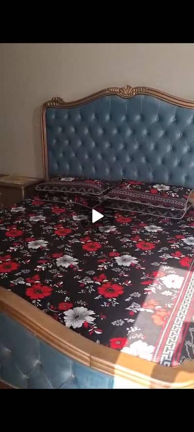 bed with dressing mirror