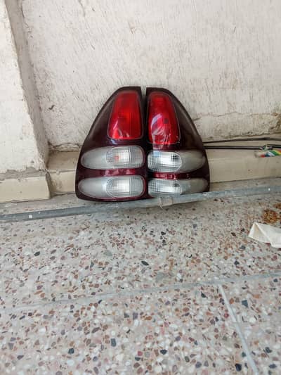 Selling original head lights of Range Rover vogue and Toyota parado T
