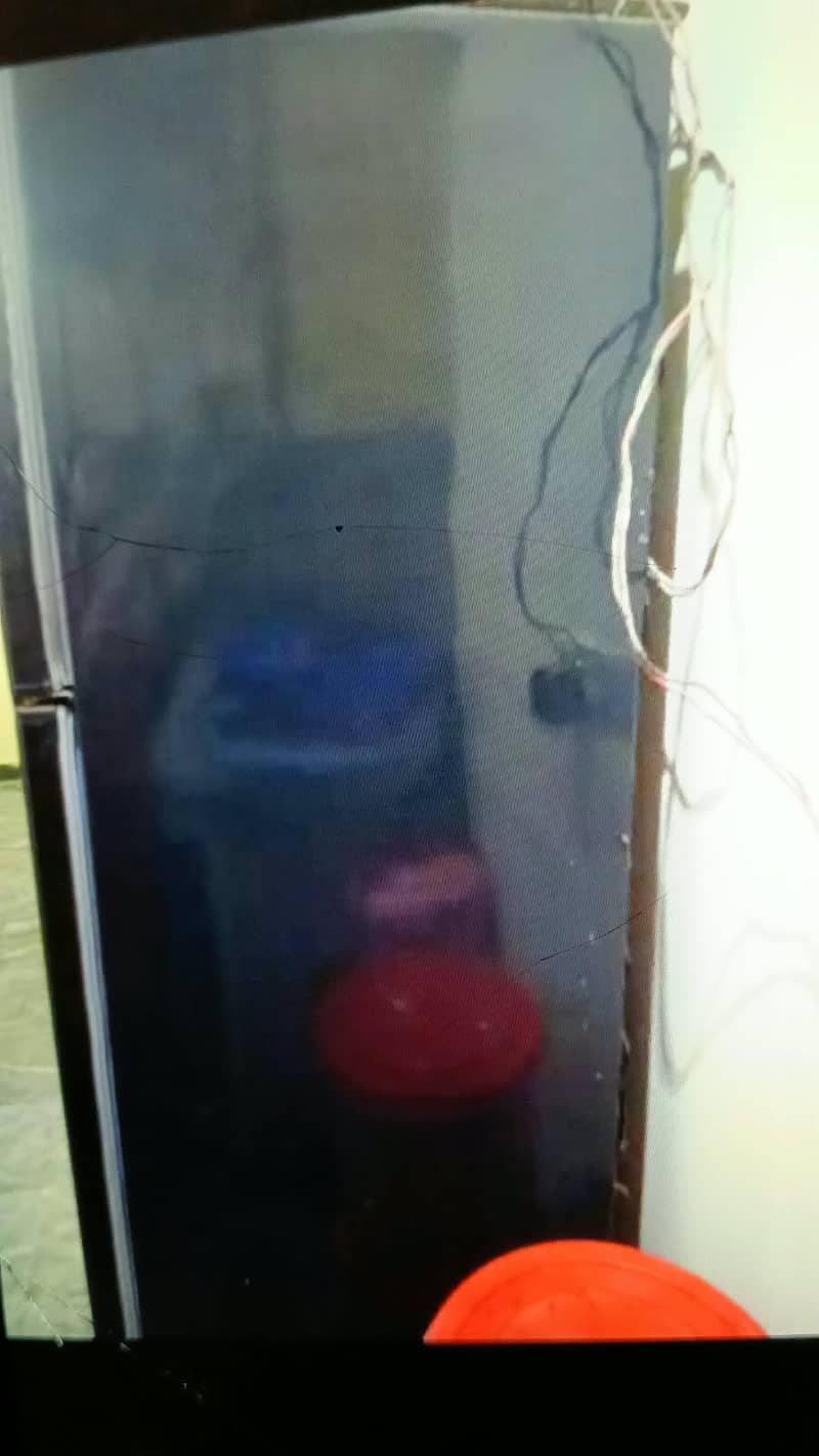 Dawlance black fridge 1