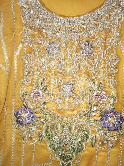 mustard 3 piece embroidery  cotton dress wear only for 2 to 3 times