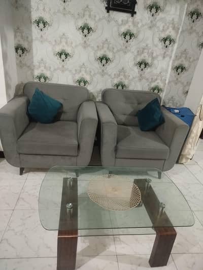 2 Seater Sofas with glass table for sale