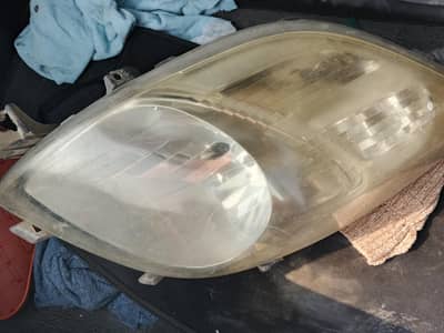 vitz 2008 headlight left side