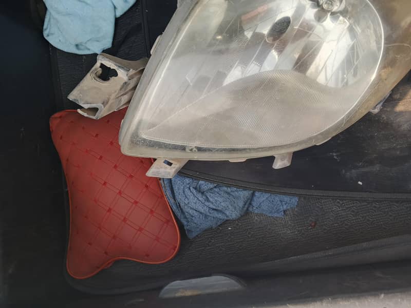 vitz 2008 headlight left side 1