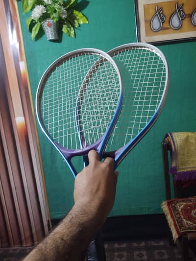 A good conditioned Tennis racket pair